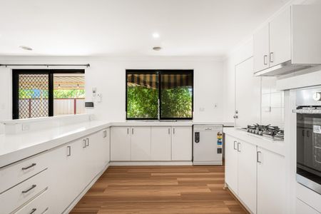 Comfortable Family Living Awaits. Renovated, Large Home in Excellent Locale. - Photo 4