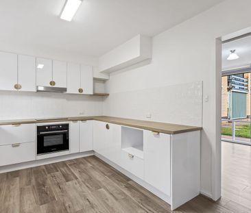 Stylish, Low-Maintenance Living Just Minutes from the Beach - Photo 6