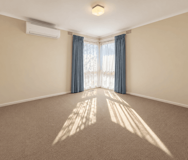 Brand-New Air Conditioning Throughout — Comfortable Three-Bedroom L... - Photo 2