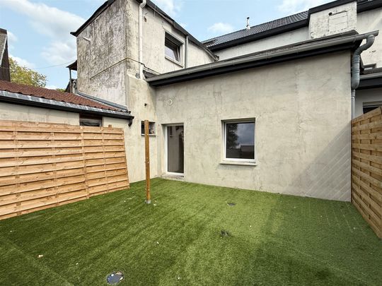 Gelijkvloersappartement met tuin en 2 slaapkamers! - Photo 1