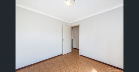 Low maintenance unit in heart of Rockingham - Photo 5