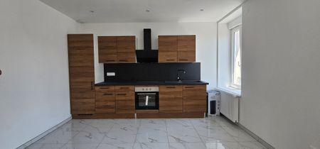 Location Appartement 3 pièces 63m² MULHOUSE 68100 - Photo 3