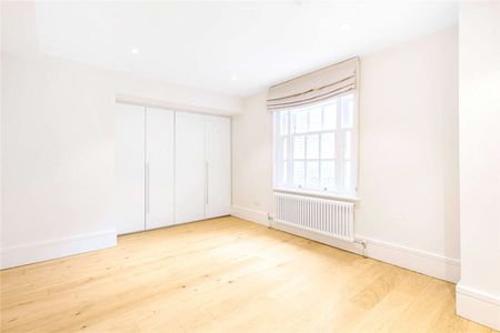 A two-bedroom, two-bathroom, first floor apartment with wooden flooring and air conditioning moments from the King's Road - Photo 5