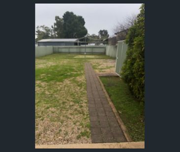 Tidy 3 Bedroom Home with Enclosed Yard - Photo 5