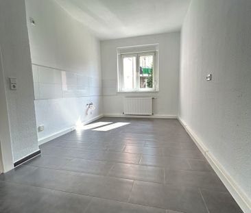 Großzügig geschnittene 2-Zimmer-Wohnung im Erdgeschoss - Foto 4