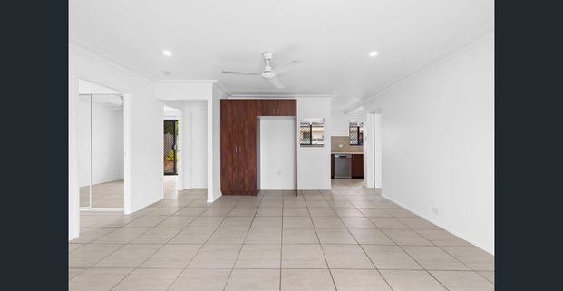 Delightful 3 bedroom with modern kitchen and fenced yard. - Photo 1