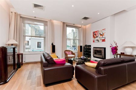 This extremely spacious three bedroom maisonette, benefits from having a large living space, as well as a private roof terrace. - Photo 3