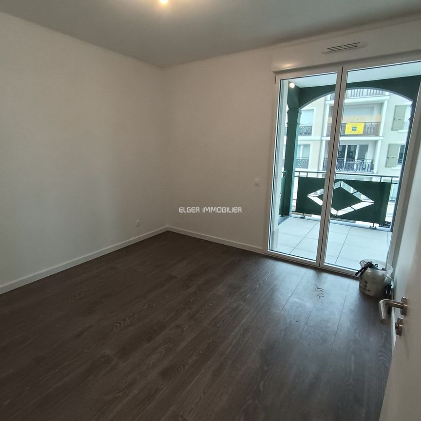 Location - appartement - 65.01 m² - 3 Pièces - Photo 1