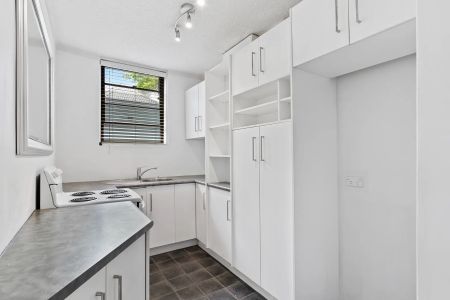 Peacefully positioned two bedroom plus sunroom apartment. - Photo 4