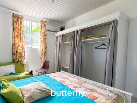 Location Appartement 3 pièces 64m² LES ABYMES 97139 - Photo 2