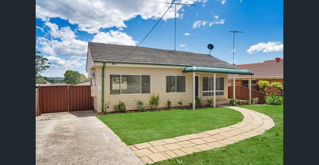Updated three-bedroom home - Photo 1