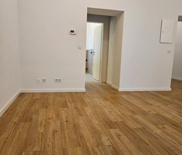 Luxuriöse 2-Zimmer Erdgeschosswohnung mit großer Terasse - Foto 1