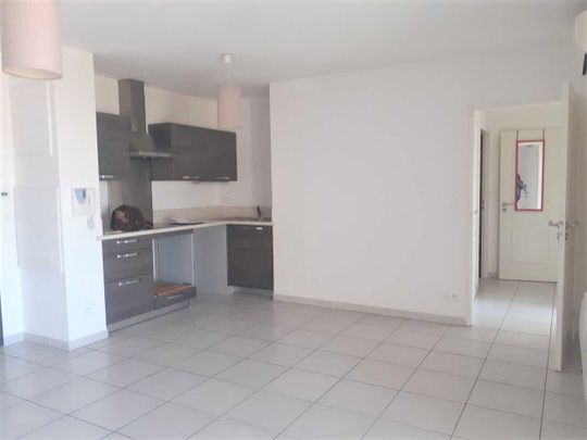Location Appartement 2 pièces 54m² NIMES 30000 - Photo 1