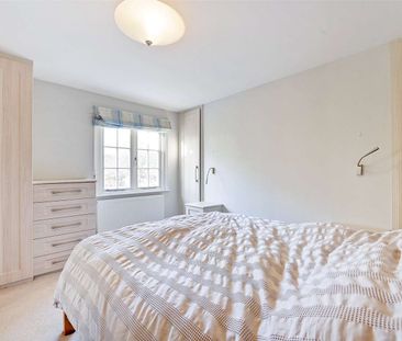 This cottage is a delightful period property located in the heart o... - Photo 4