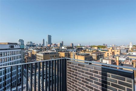 A 3 bedroom sixth floor apartment located within a boutique development, Shoreditch Village. - Photo 3