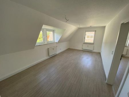 Einziehen und Wohlfühlen: Freundliche 3-Zimmer-Wohnung im Dachgeschoss - Foto 5