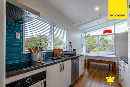 Experience the charm of this home nestled in the tranquil neighborhood of Titirangi. - Photo 2