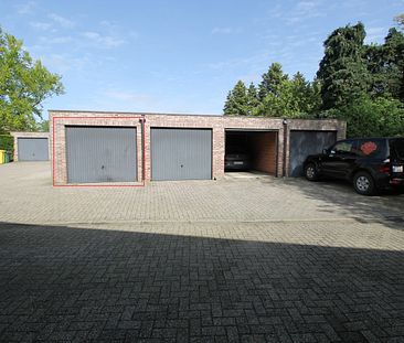 Een instapklaar appartement op de benedenverdieping links van de rechter ingang - met terras en garage. - Photo 2