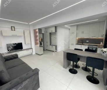 De inchiriat apartament tip penthouse cu 2 camere terasa si loc de parcare in zona Calea Surii Mici din Sibiu - Photo 3