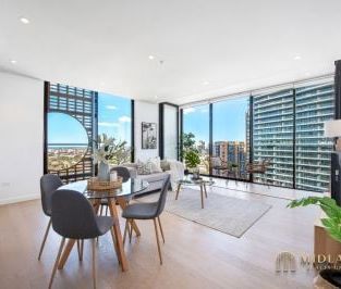 Stunning Two-Bedroom Penthouse with Breathtaking Water Views - Photo 5