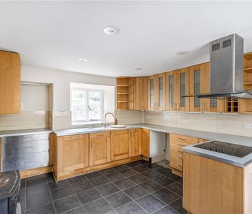 A pretty period detached house in the popular village of Mells with... - Photo 1