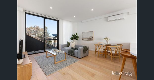 Brand New Three Bedroom Townhouse with Roof Top and City Views - Photo 1