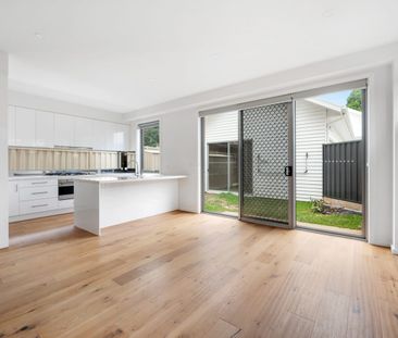 Stylish, Spacious Living with Modern Comfort Across Two Levels - Photo 4