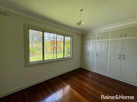 ELEVATED FARMHOUSE WITH SHED - Photo 5