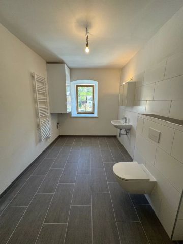 Erstbezug mit Terrasse und Personenaufzug: Moderne 2-Zimmer-Wohnung in St. Kathrein am Hauenstein! - Photo 3