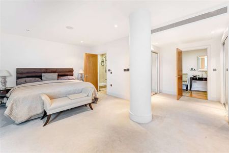 A stunning, unique three bedroom apartment with 180 degree river views in St George Wharf. - Photo 5