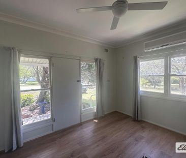 Rural home in the heart of town - Photo 2