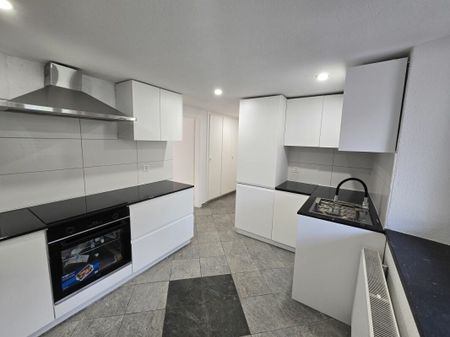 Appartement de 2,5 pièces au rez-de-chaussée - Photo 5