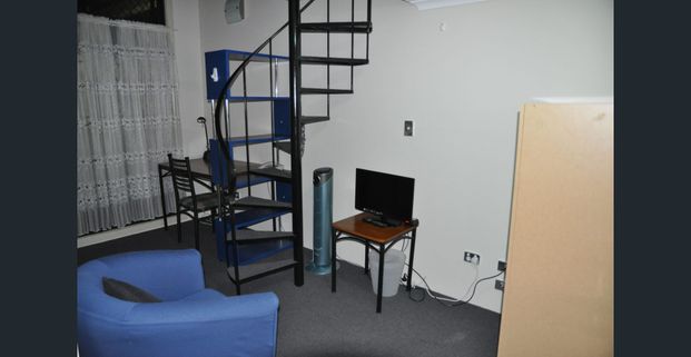 FURNISHED STUDIO LOFT STYLE IN THE HEART OF BROADWAY - Photo 1