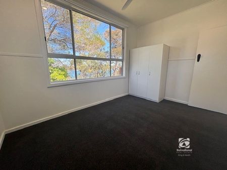 FRESHLY RENOVATED ON THE LAKES EDGE! - Photo 3