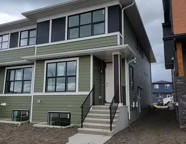 Brand New 3 Bedroom Duplex with Flex & Bonus rooms and Garage in Rockland Park | Calgary - Photo 1