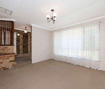 3-Bedroom Home with Multiple Living Areas - Photo 6
