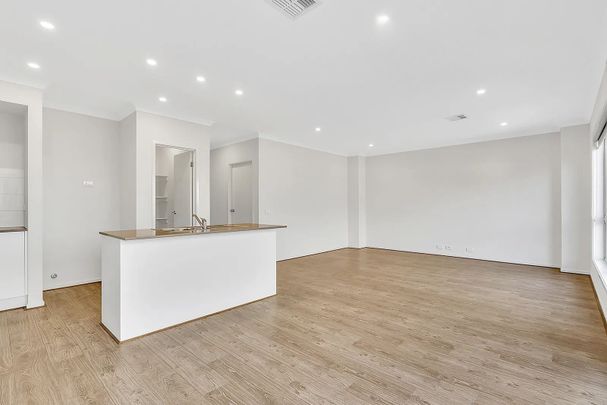 Stylish Double-Storey Living with Master Suite! - Photo 1