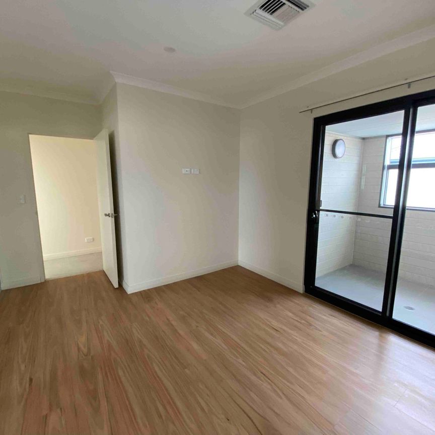 Modern Coastal Apartment - Photo 1