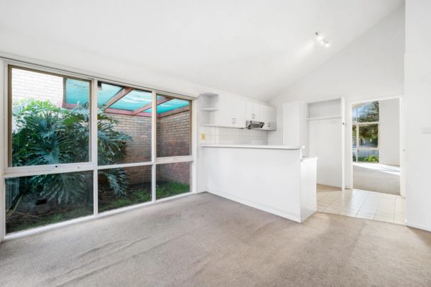 Newly Re-Carpeted 2 Bedroom, 2 Living, With Secure Double Garage Townhouse - Photo 1