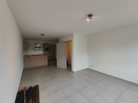 Gelijkvloers app. met 1 slaapkamer en autostaanplaats! - Foto 2