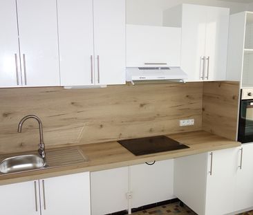 Location Appartement 2 pièces 40m² NIMES 30900 - Photo 4