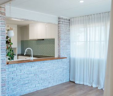 Renovated Dual-Level Home with Flexible Living Options - Photo 4
