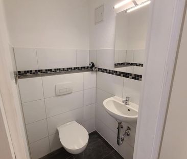 modernisierte 2,5-Zi.-Wohnung mit Einbauküche, Bad, Gäste-WC und Ti... - Foto 6