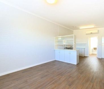 Coastal Comfort & Convenience - Charming Home in Prime Rockingham L... - Photo 4