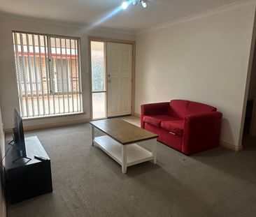 LOW MAINTENANCE & FULLY FURNISHED UNIT! - Photo 1