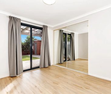 “Low maintenance bottom floor apartment” - Photo 4