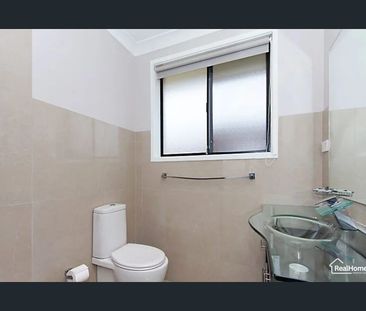 Charming Family Home with Spacious Yard in Prime Quakers Hill Location - Photo 3