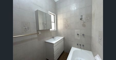 Spacious Family Retreat in Prime Location! - Photo 3