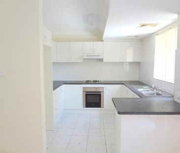 Charming Townhouse with Private Backyard - Photo 3