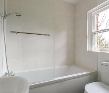 An updated two bedroom semi-detached cottage located in the village... - Photo 6